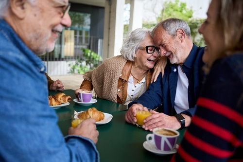 Group of seniors enjoying breakfast
