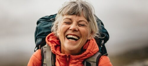 Senior woman with backpack