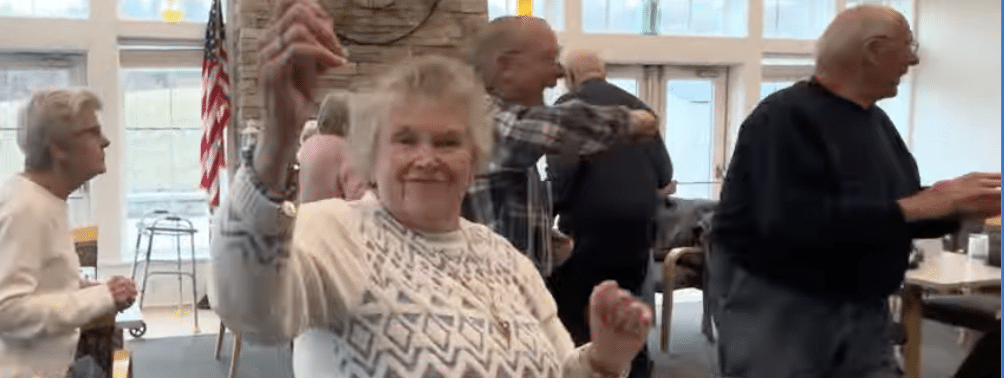 Senior woman dancing at Fairview senior living